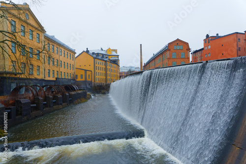 Waterfall in the river Motala Strom in central Norrkoping in Sweden photo