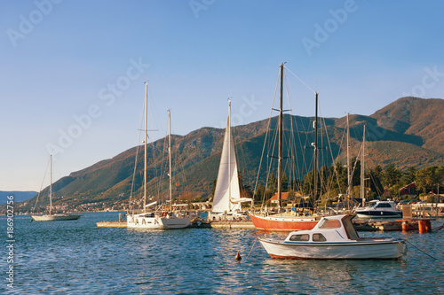 Yachts and fishing boats on the water on a sunny day. Montenegro, Bay of Kotor (Adriatic Sea), Tivat