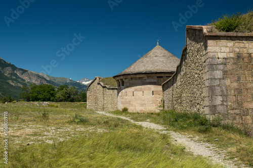 Mont-Dauphin fortification with snowy Alps mountains on the background, near french city of Gap.