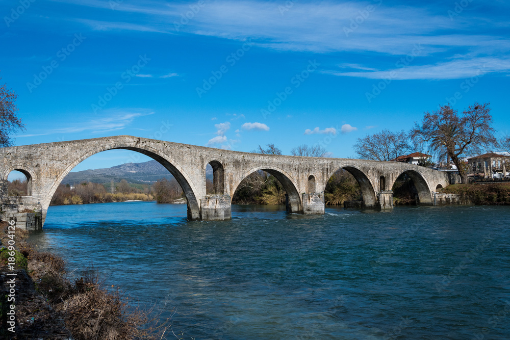 Bridge of Arta in Greece. A stone bridge that crosses the Arachthos river in the west of the city of Arta. The folk ballad 