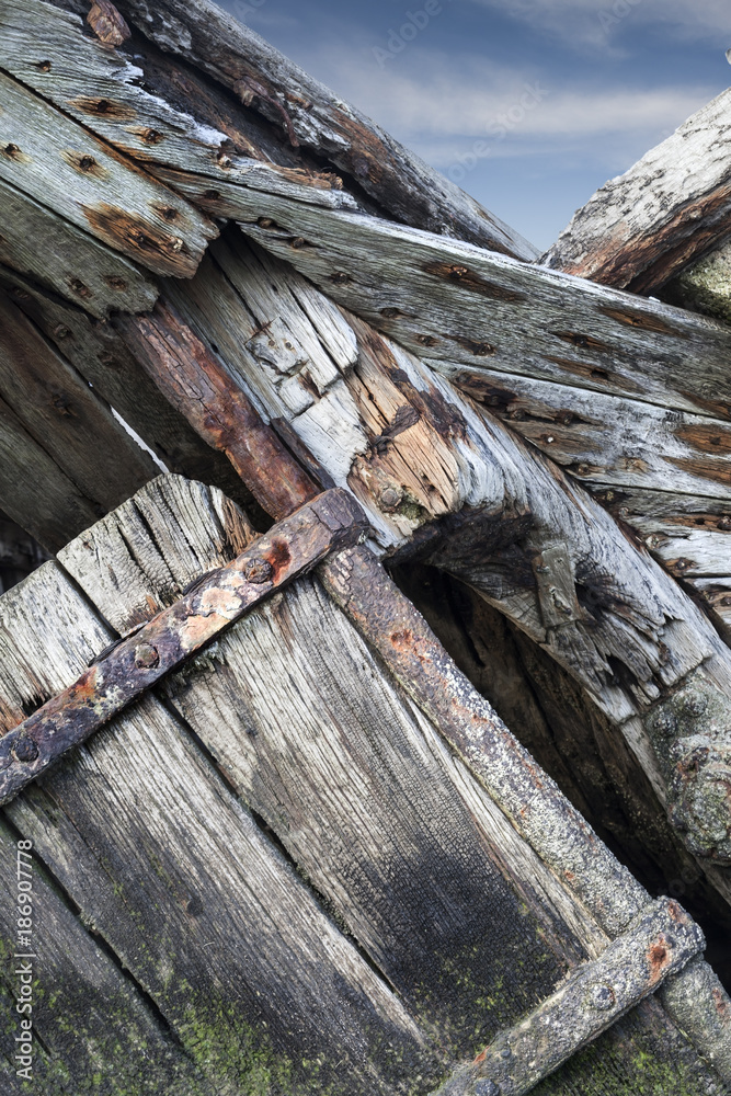 Detail of an old abandoned ship in a ship cemetery, Camaret Sur Mer, France Detail of an old abandoned ship in a ship cemetery, Camaret Sur Mer, France