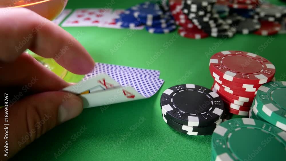 Poker Player Moves Chips on Table at Casino. Casino Chips And Double Aces. Winner In Poker. Poker Player Going All-in Poker Player Moves Chips on Table at Casino. Casino Chips And Double Aces. Winner In Poker. Poker Player Going All-in