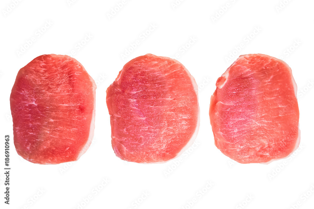 Three pieces of pork meat isolated on white background.