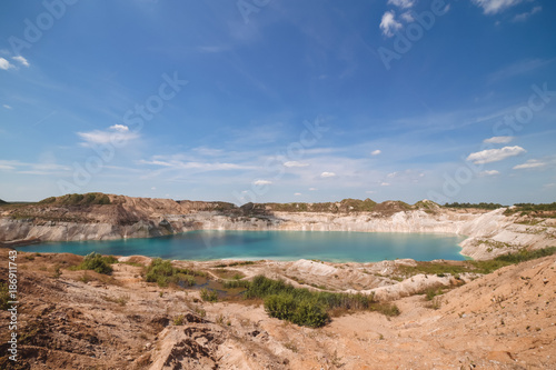 chalk quarry with blue water