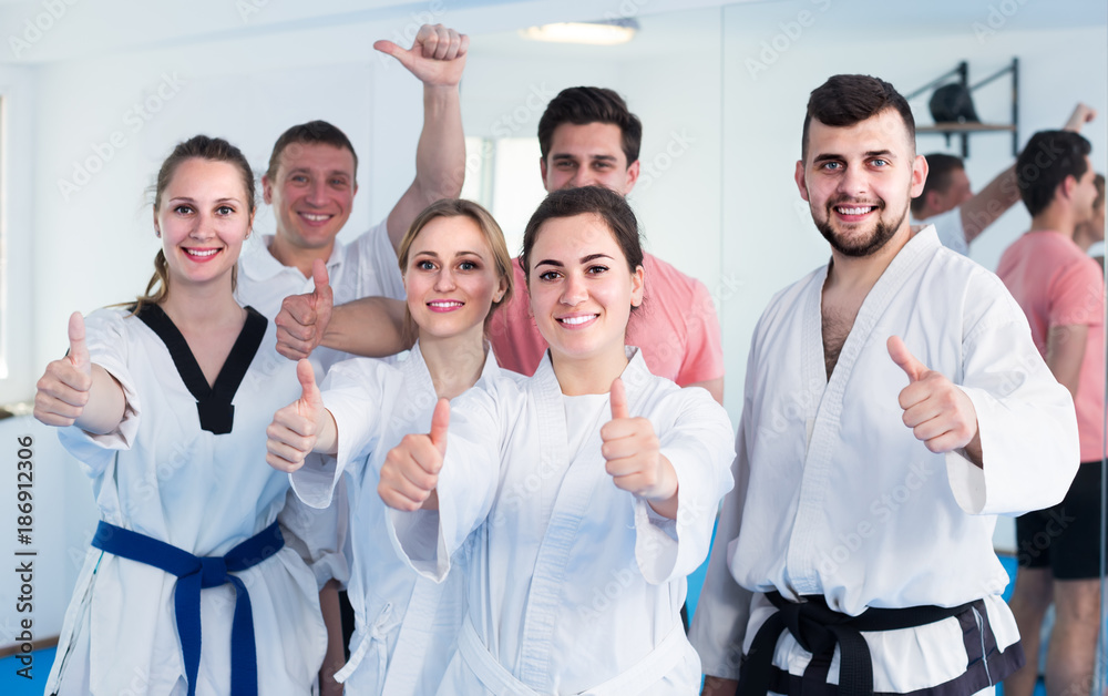 Fototapeta trainees expressing interest in attending karate class