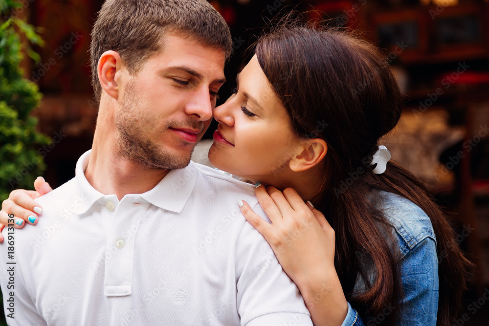 girl sensually hugs her boyfriend girl sensually hugs her boyfriend