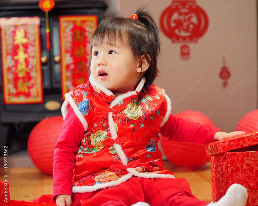Chinese baby girl traditional dressing up celebrate Chinese new year Chinese baby girl traditional dressing up celebrate Chinese new year