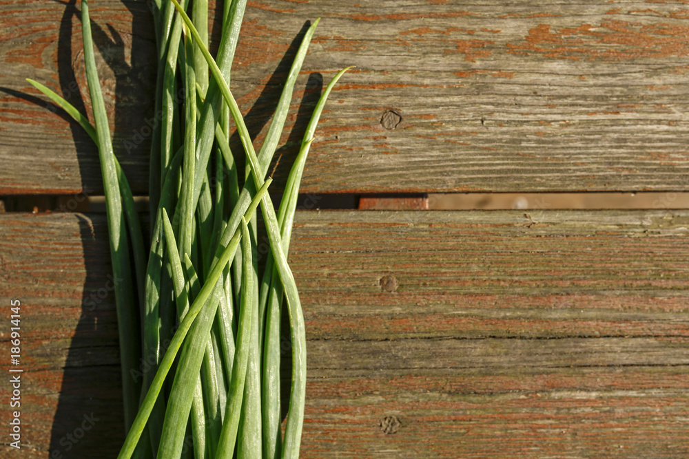 bunch of fresh chines on wooden background bunch of fresh chines on wooden background
