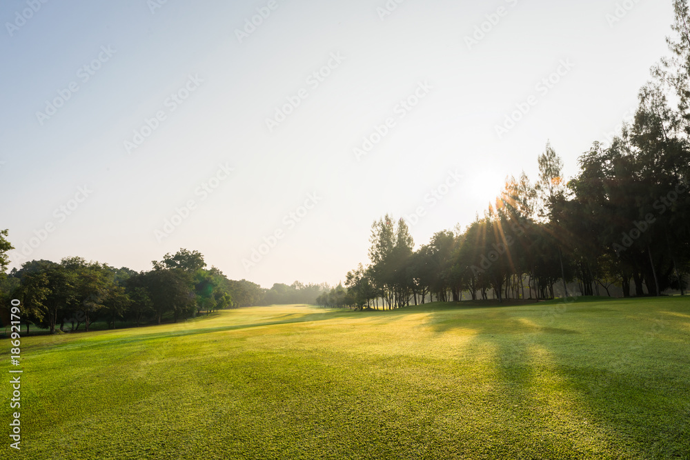 Scenery green golf and meadow with sunbeam in morning, Wonderful sunbeam at the natural park