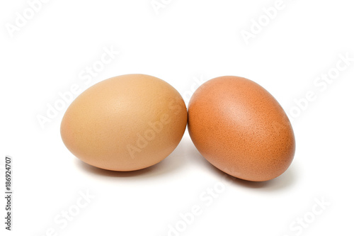Two brown chicken egg isolated on white background