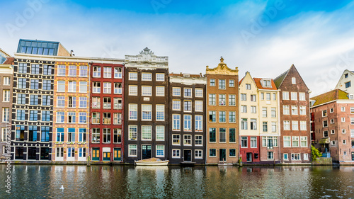 Canal houses of Amsterdam, Netherlands. Traditional old buildings in Amsterdam © EwaStudio