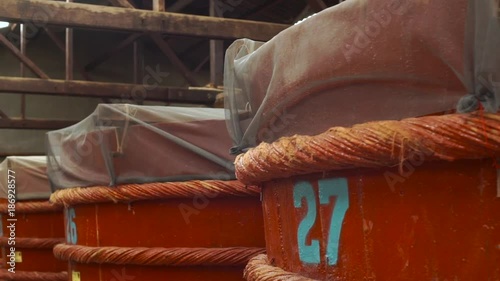 Wooden barrels in a fish sauce factory on Phu Quoc island photo