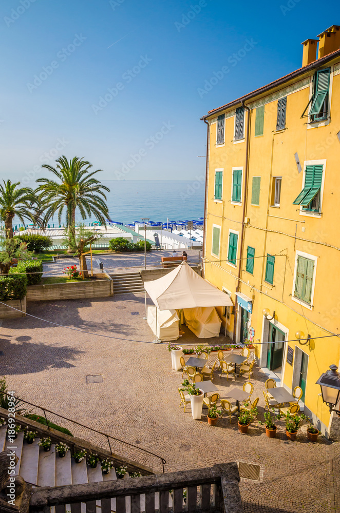 Obraz premium Narrow streets and traditional buildings of Celle Ligure, Liguria, Italy