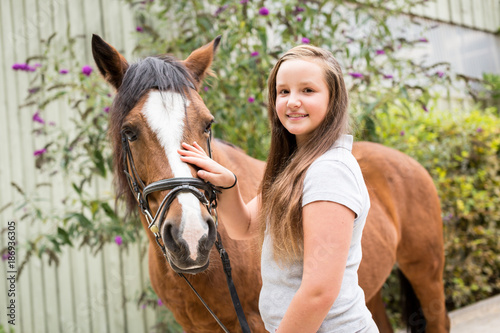 Teenage Girl With Her Pony