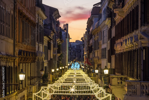 Rome, Italy - Piazza di Spagna square and the Trinità dei Monti stairway during the Christmas holiday, with lights decorations and Christmas tree photo