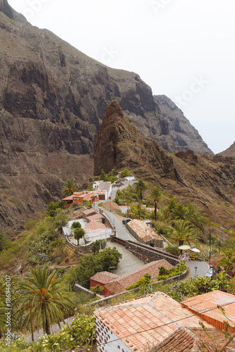 Small village deep in mountains with steep cliffs around © Martin Hossa