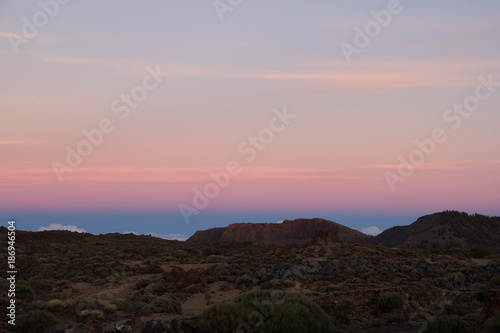 Colorful skies over desert landscape at dawn