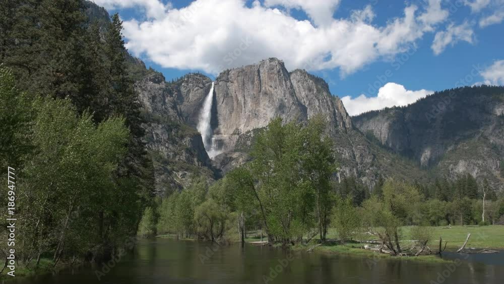 merced river and yosemite falls in yosemite national park during spring runoff merced river and yosemite falls in yosemite national park during spring runoff