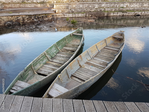 old boat in small port of Ioannina city Epirus Greece photo