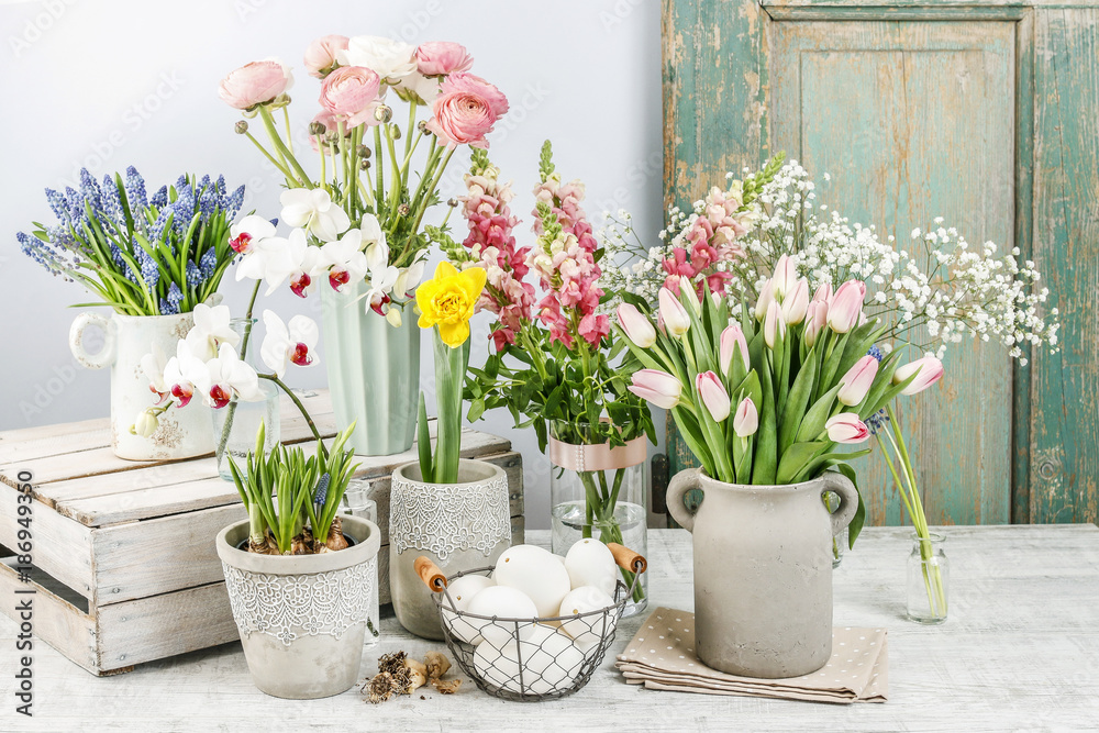 Spring flowers on wooden table. Spring flowers on wooden table.