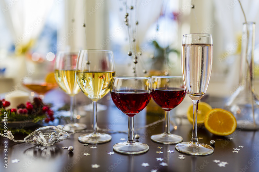 White and red wins and drinks in glasses. White and red wins and drinks in glasses.