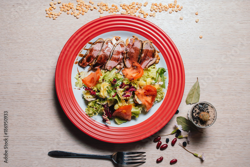 duck breast salad and vegetables photo