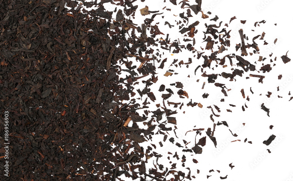 Dry black tea leaves isolated on white background, top view
