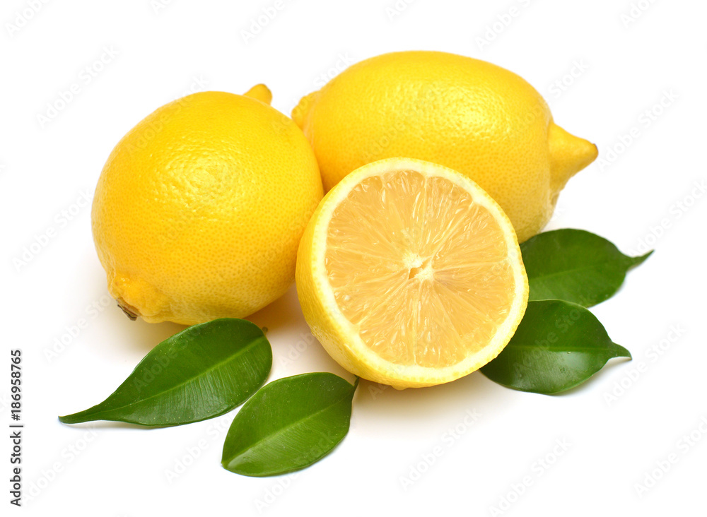 Lemons beautiful whole and sliced with leaves isolated on white background. Vitamin C. Tropical useful fruit. Flat lay, top view