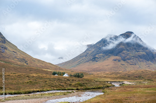 Scenic Landscape View of Mountain, Forest and Lake in Scottish Highlands.