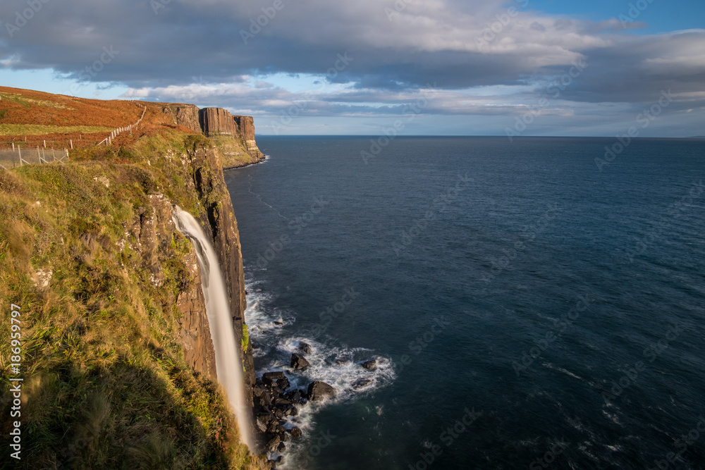 Kilt Rock and Mealt Falls, Picturesque observation point offering panoramic views of waterfalls, cliffs & sea in Isle of Skye, Scottish Highlands