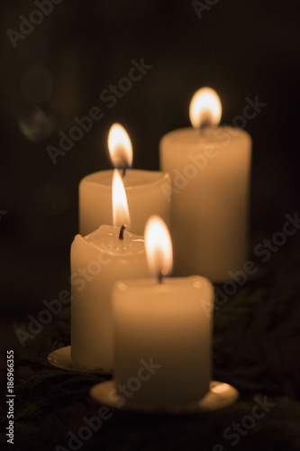 Four candles in detail