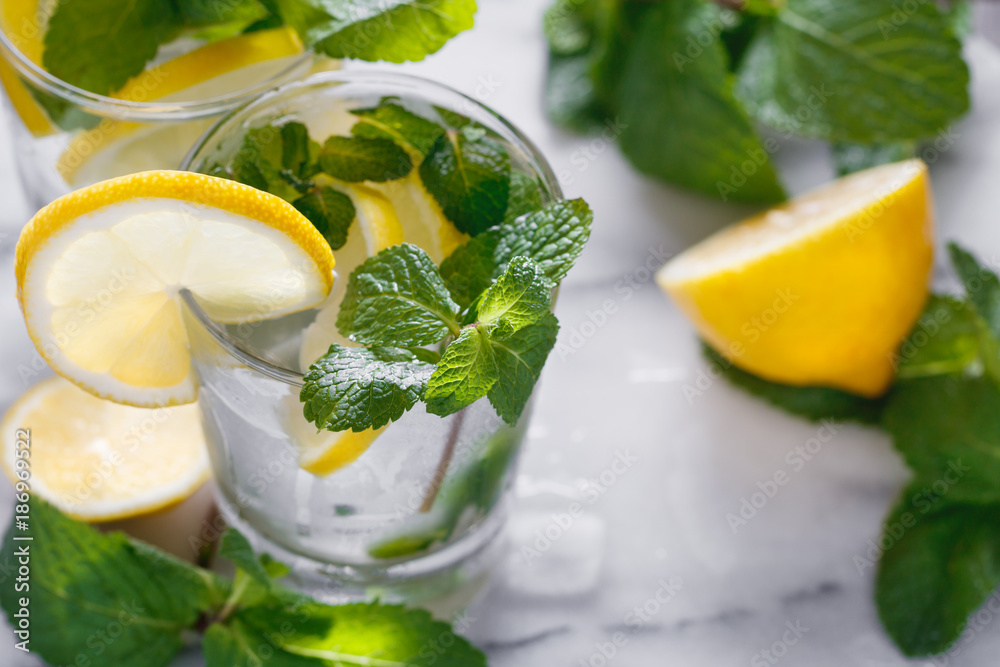 Fototapeta premium View from above on two glasses with reshness cold lemonade.