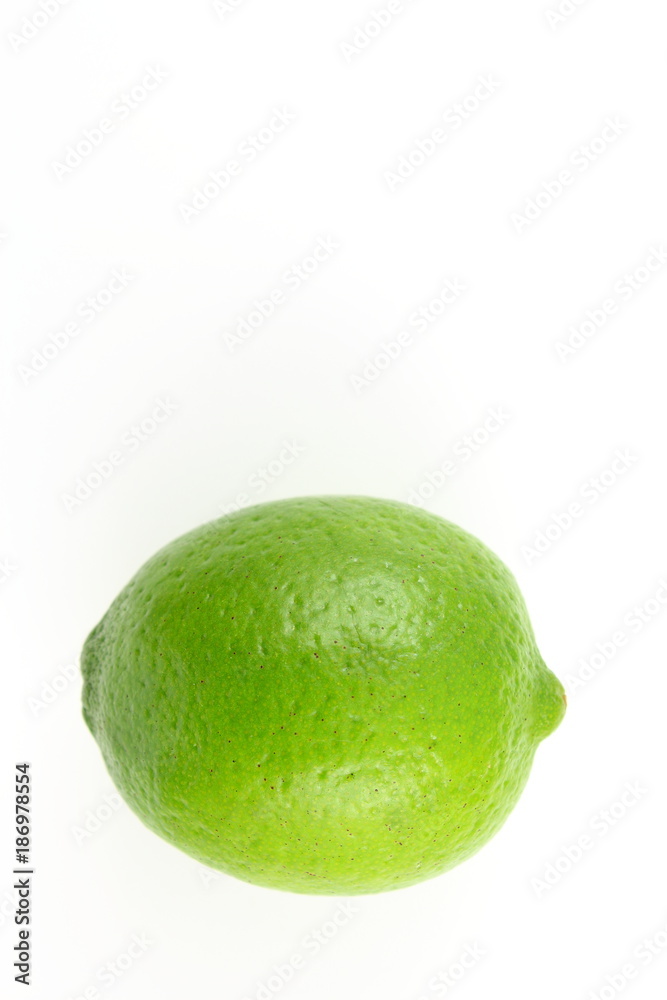 fresh lime fruit isolated on a white background with copy space fresh lime fruit isolated on a white background with copy space