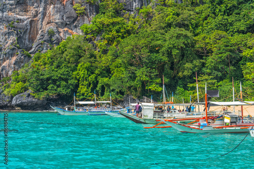 El Nido bay scenic islands view with bangka boats, Palawan, Philippines © Alexey Pelikh