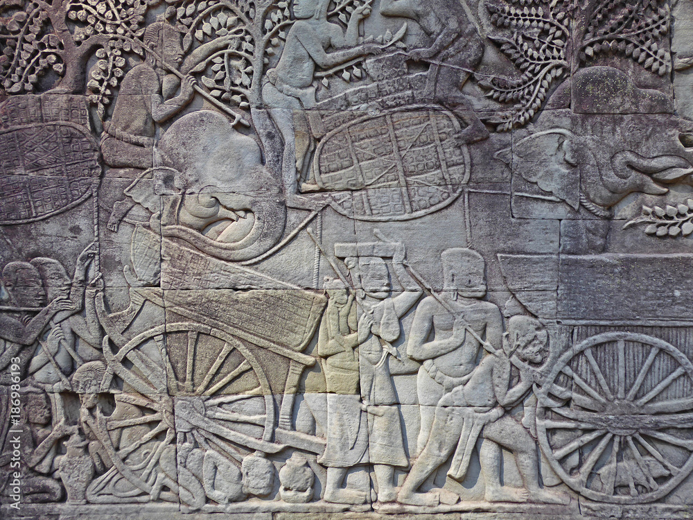 Scupted stone bas relief culture of Khmer at Angkor Wat  