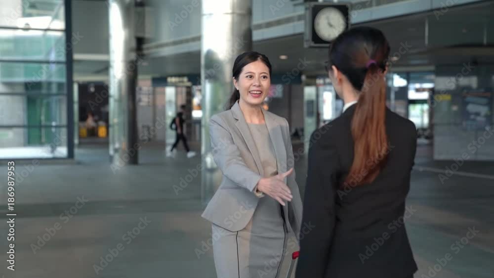 business female manager handshake greeting business female manager handshake greeting