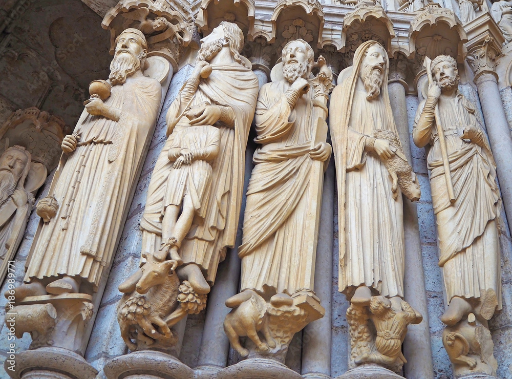 Statues (details) at Cathedrale Notre Dame de Chartres, a medieval old Catholic cathedral in Chartres, France