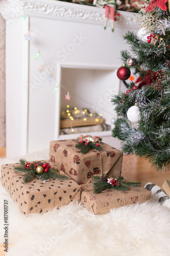 beautiful holiday gifts under the Christmas tree