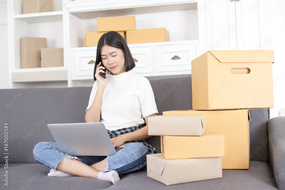 Asian woman working at home. People with SME, Delivery, Online Business success concept.