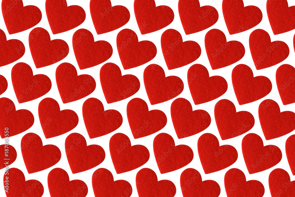 Red felt hearts isolated on white background. Valentines day pattern.