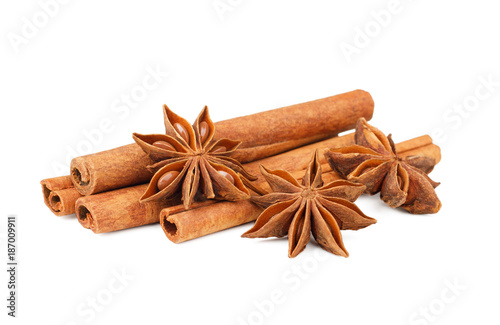 Cinnamon sticks and star anise spice isolated on white background.