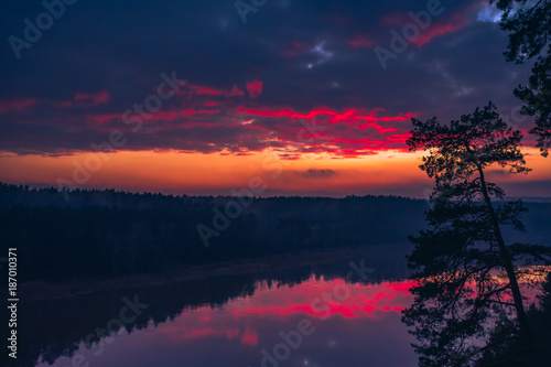 Aerial sunrise or sunset with colorful deep red sky