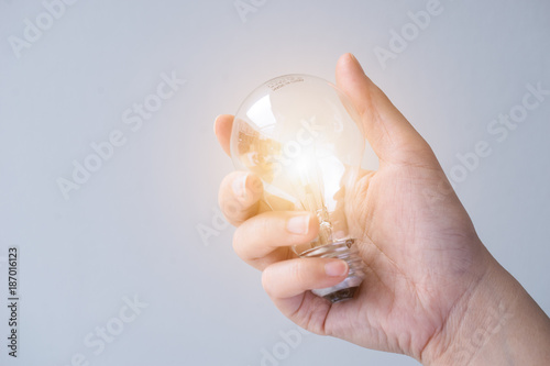 Business women holding light bulbs, ideas of new ideas with innovative technology and creativity.