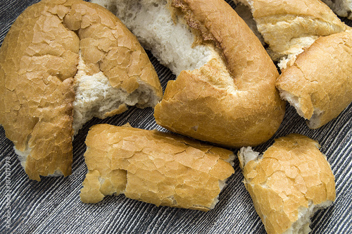 Quadro su tela waste of bread, the bread stale bread thrown into the trash,