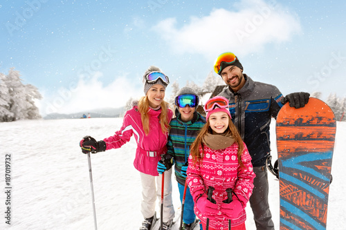 Skiers family together on skiing