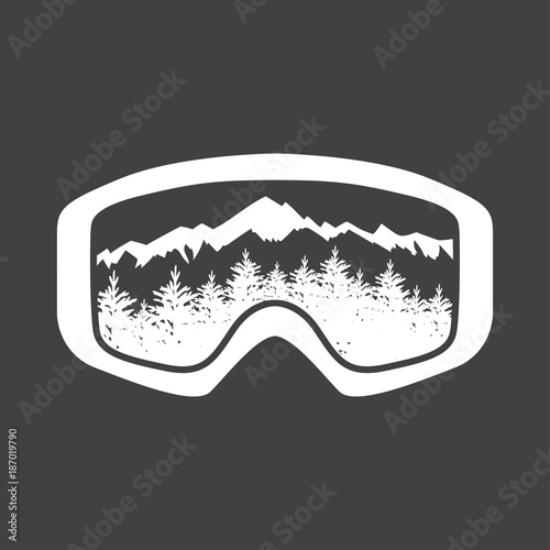 mountains in reflection of ski mask lens.