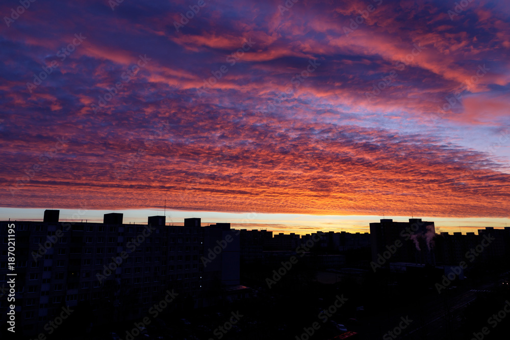 sunrise sky in the city with building shadow-figure