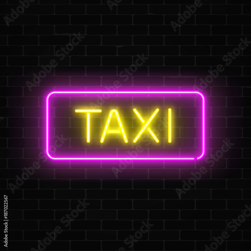 Neon uber and taxi transportation services signs in a geometrical shape on a brick background.