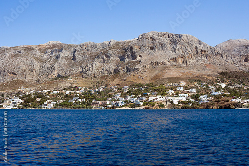 The seafront of Myrties, Kalymnos. View from Telendos island. Dodecanese Islands
 photo