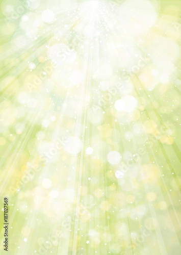 Vector green background with rays, stars and lights.